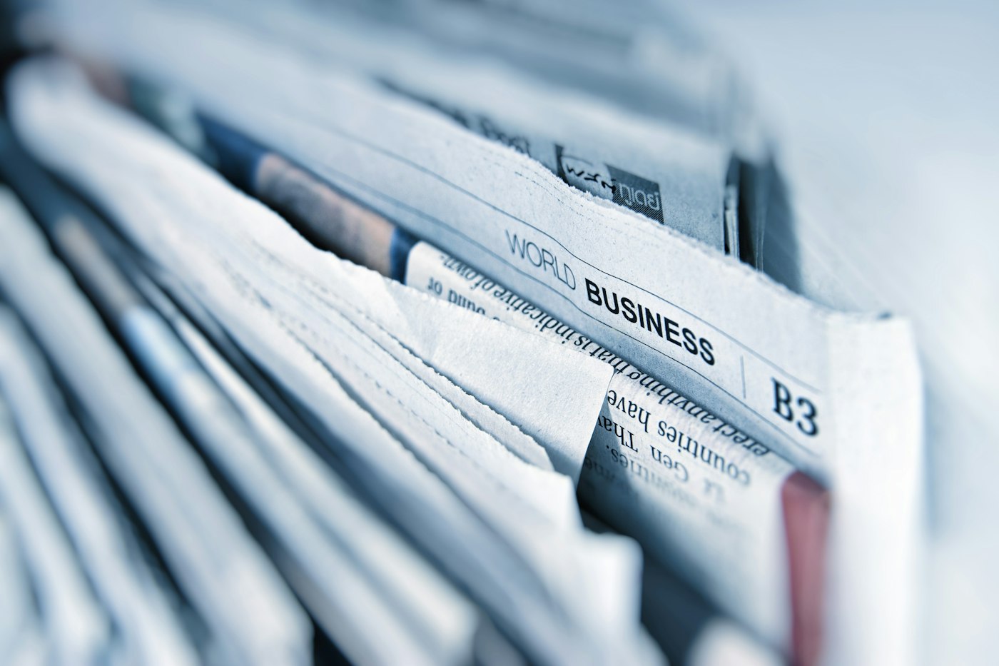 Stack of business newspapers